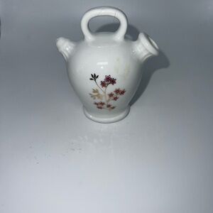 Elegant White Ceramic Vase with Floral Design
